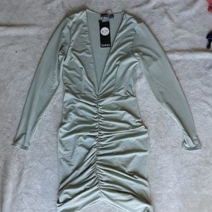 Long-sleeve green mini dress